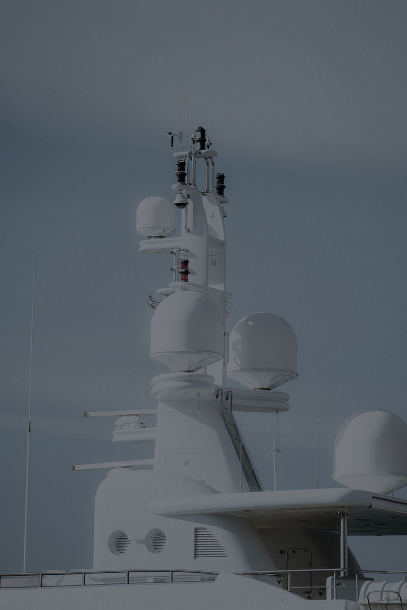 Radar and satellite domes mounted on a vessel's mast